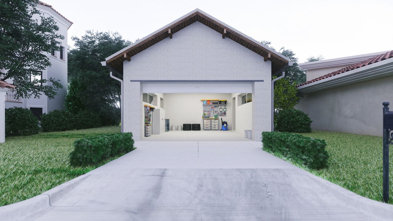 Open Garage With Concrete Driveway