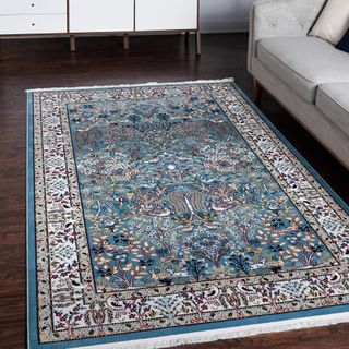 A blue and cream Persian style rug