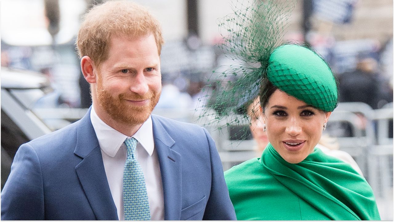 Prince Harry and Meghan Markle hold hands