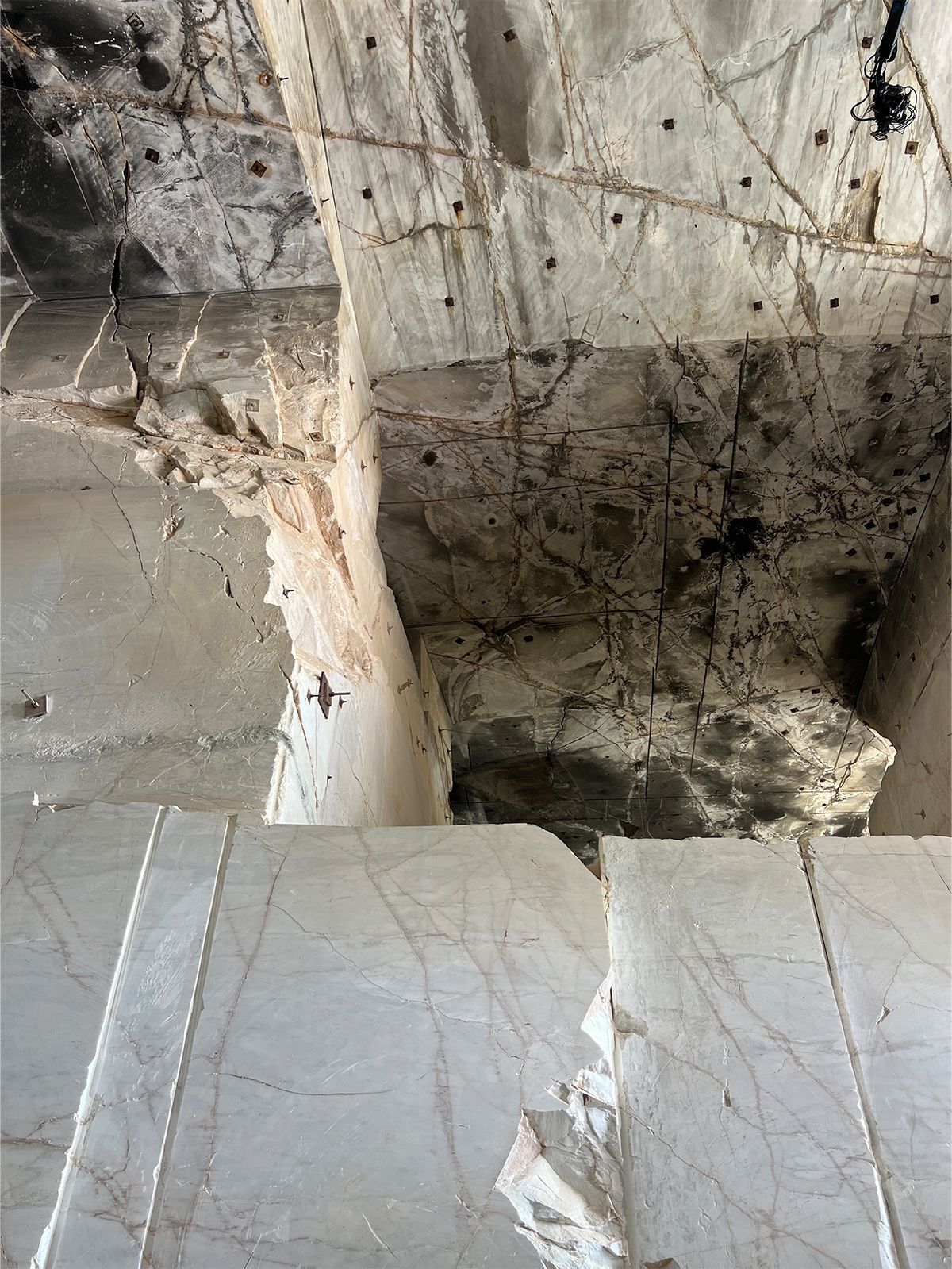 COS's S/S 25 show in a marble quarry outside of Athens, Greece.