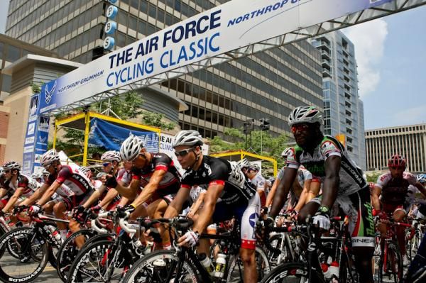 The men line up for the real start downtown.