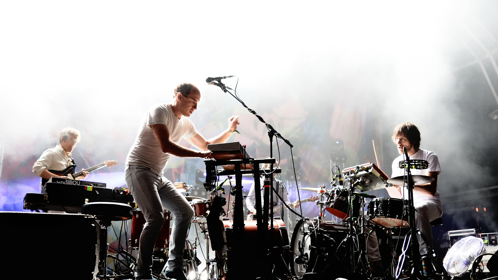 Caribou's Dan Snaith on stage with his live band