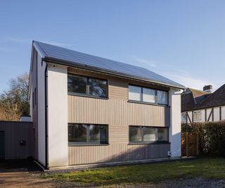 exterior of a detached house that has been renovated to EnerPHit standards