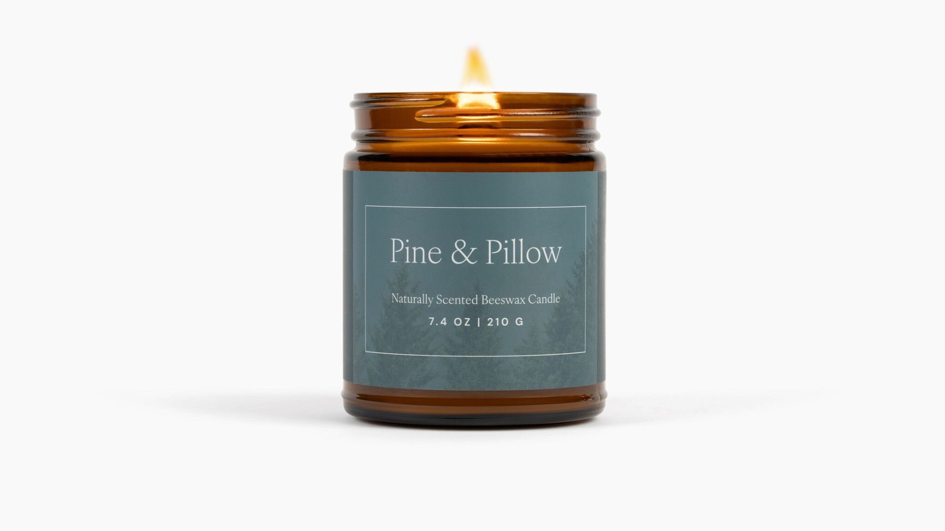 The Naturepedic Pine &amp;amp; Pillow Candle on a white background.