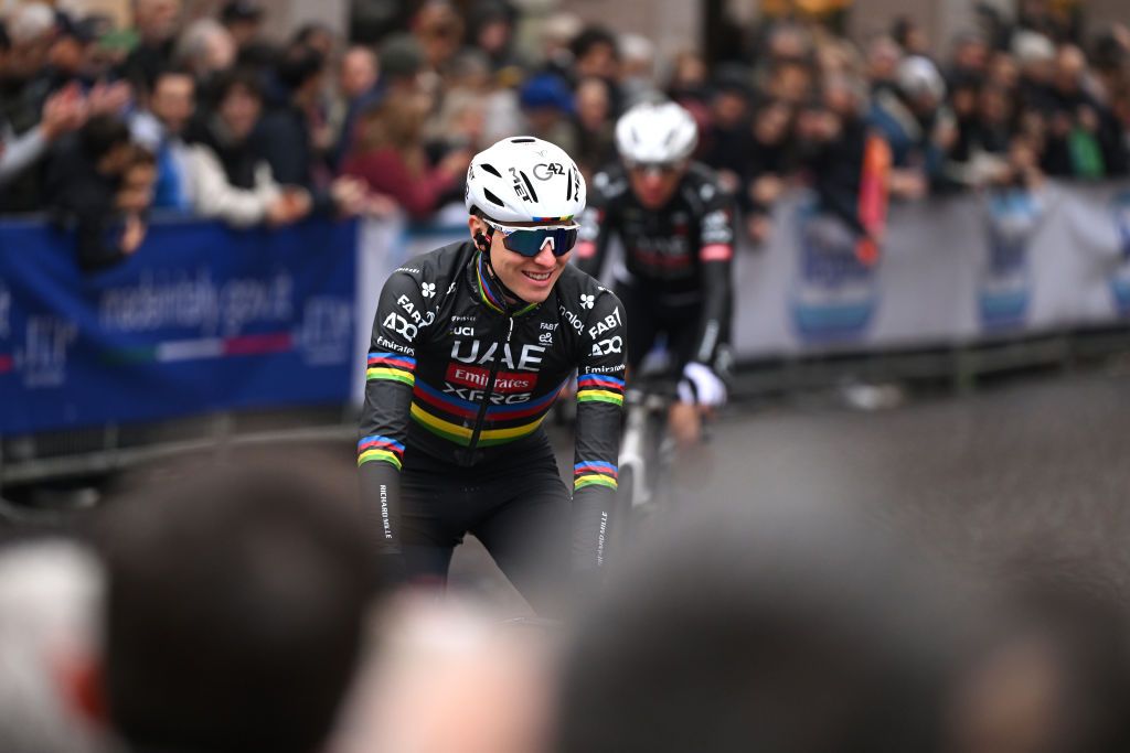 Tadej Pogačar smiling at the start of Milan-San Remo 2025