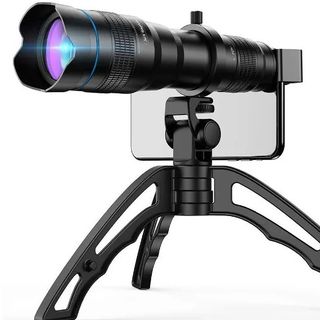 Apexel 36x telephoto lens mounted to smartphone on miniature tripod