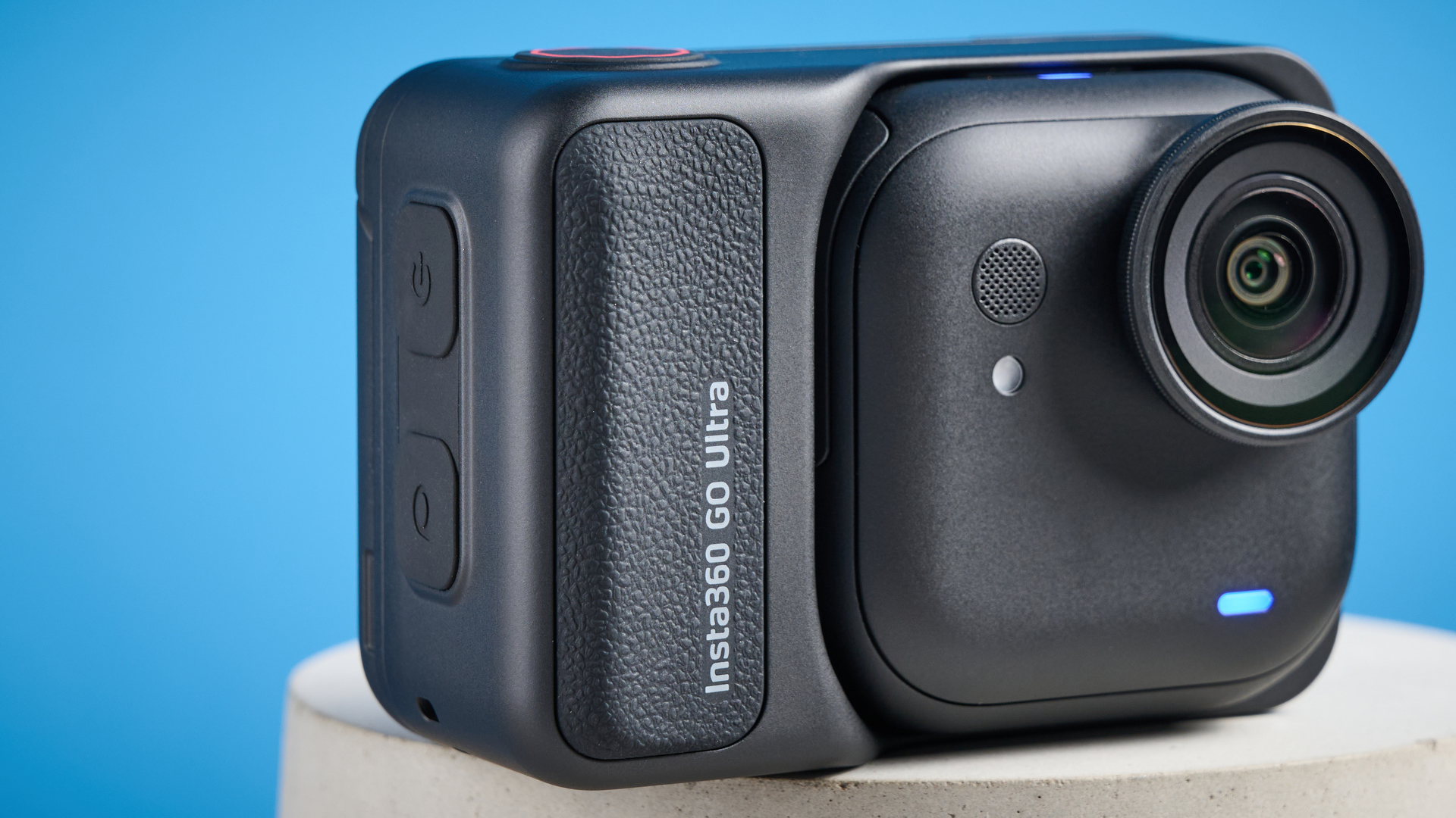 Insta360 Go Ultra against a blue background