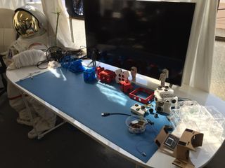 Some of SpaceVR's gear, including a prototype (on the upper-right corner of the table) of the Overview One camera that the company aims to launch to the International Space Station in late 2015.