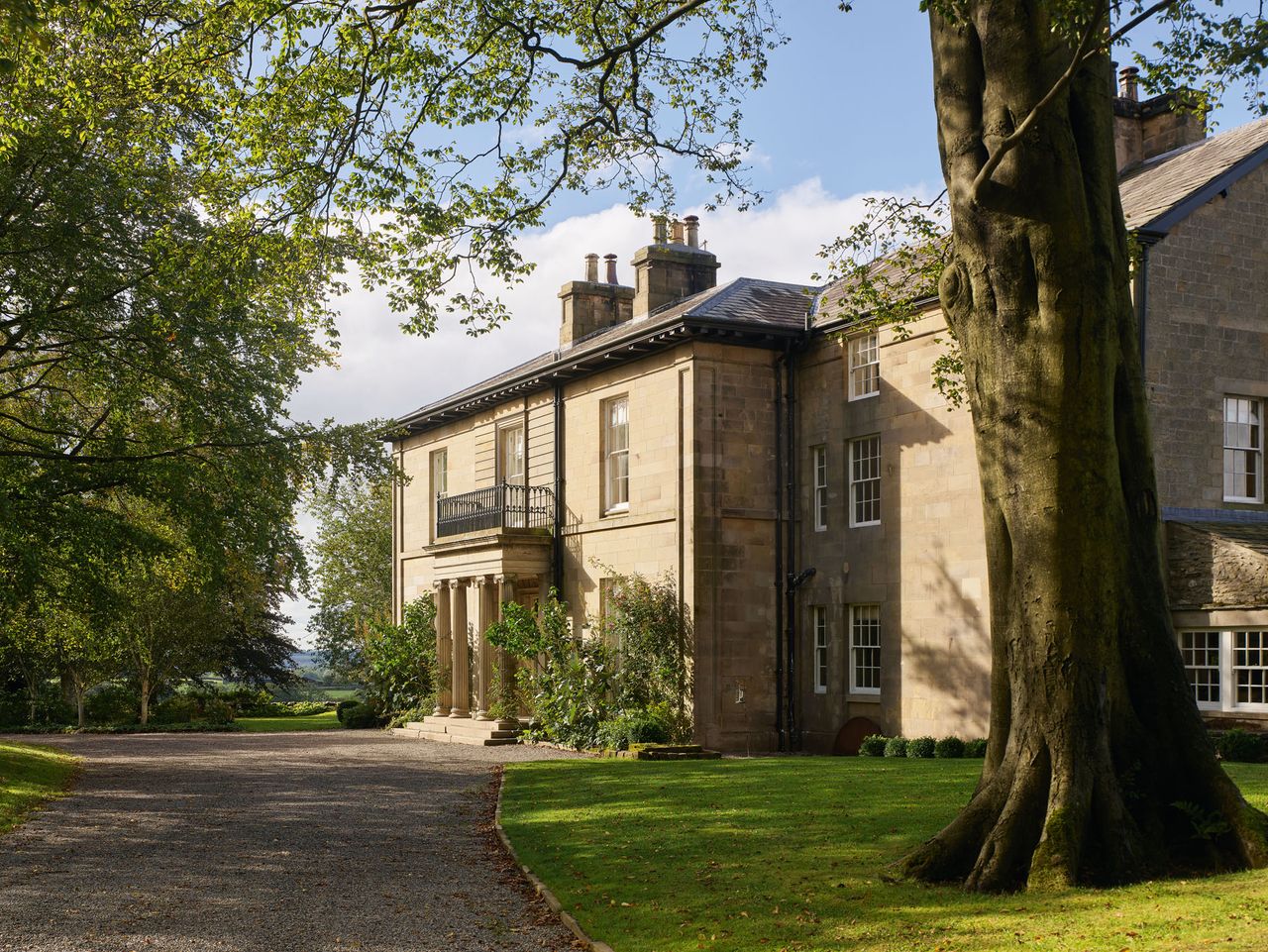 The main front of the house, with its Ionic portico, derived from the Temple on the Ilissus in Athens. Main front, Taitlands, North Yorkshire. ©Paul Highnam for Country Life