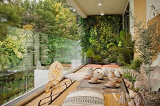 balcony ideas: living wall and glass balustrade