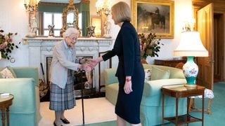 Queen Elizabeth greets newly elected leader of the Conservative party Liz Truss as she arrives at Balmoral Castle
