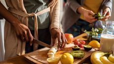 Woman cutting fruit