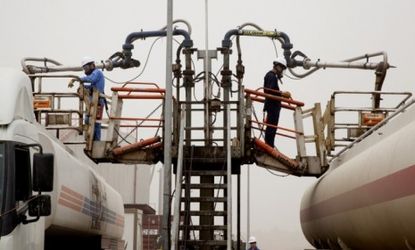 A worker fills a truck with oil at the Gulf Keystone Operations in Iraqi Kurdistan: Iraq has the potential to rival Saudi Arabia as the No. 1 exporter of oil in the world.