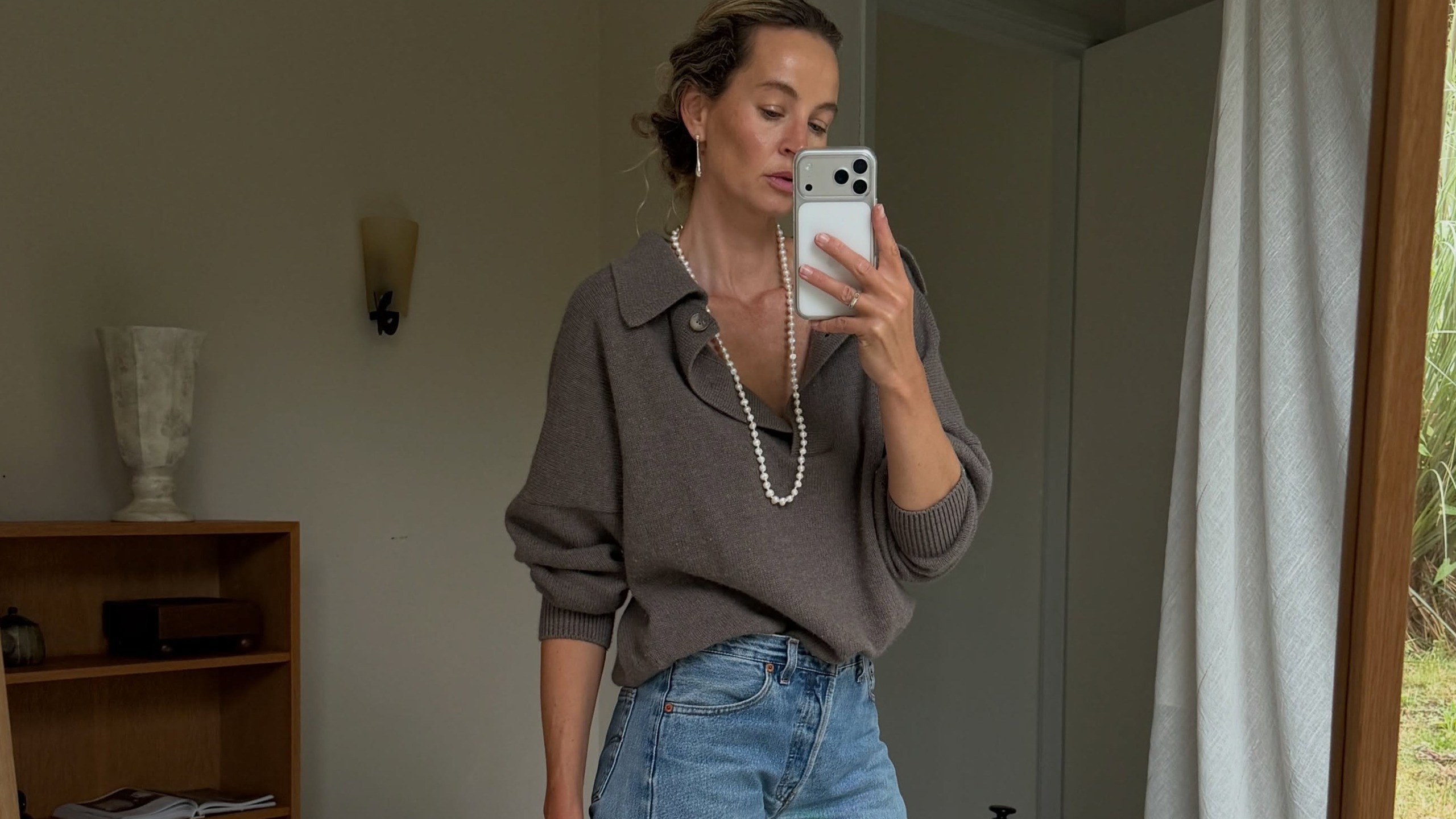 Woman in a sweater and jeans