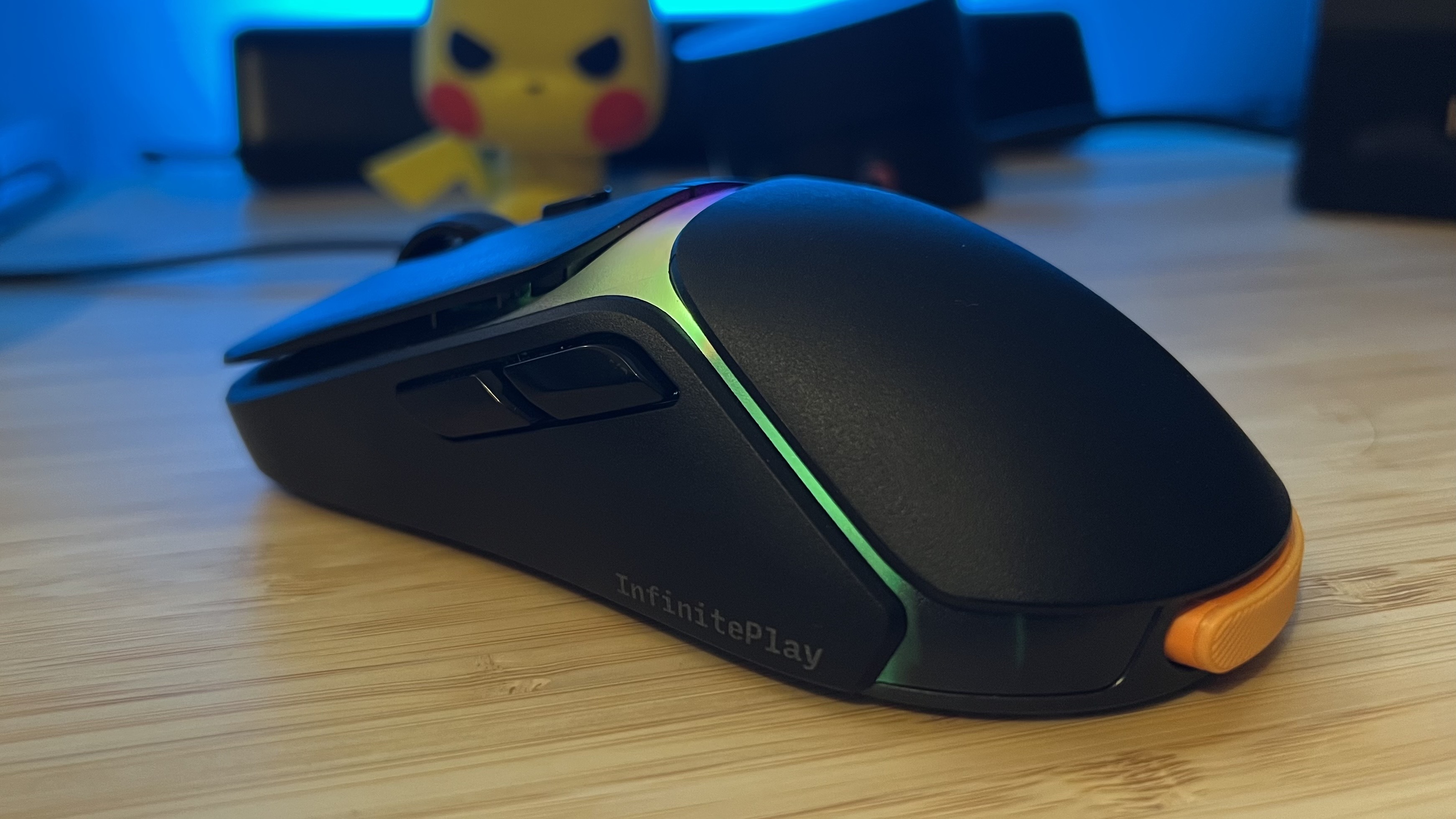 Glorious Model O 3 Wireless gaming mouse on a wooden desk