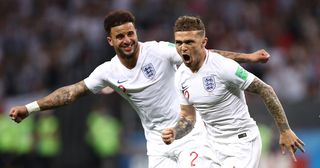 Kieran Trippier of England celebrates with team mate Kyle Walker after scoring his team's first goal during the 2018 FIFA World Cup Russia Semi Final match between England and Croatia at Luzhniki Stadium on July 11, 2018 in Moscow, Russia.