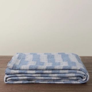 blue and white striped bedcover
