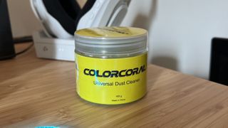 ColorCoral dust cleaner on a wooden desk