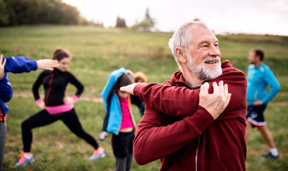 Seniors exercising outdoors.