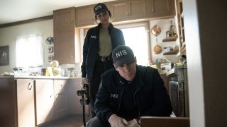 Gibbs and Lala investigating open cabinet at crime scene on NCIS: Origins