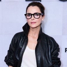 Keri Russell attended The Diplomat Season 3 premiere in a leather bomber jacket and the wide-leg trousers trend
