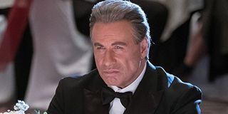 Gotti John Travolta scowling in a tuxedo