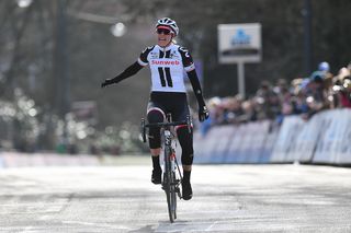 Lucinda Brand crossed the Omloop Het Nieuwsblad finish line with a comfortable advantage over her pursuers.