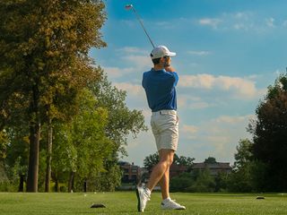 Prostate Cancer UK's big golf race competitor hitting a tee shot