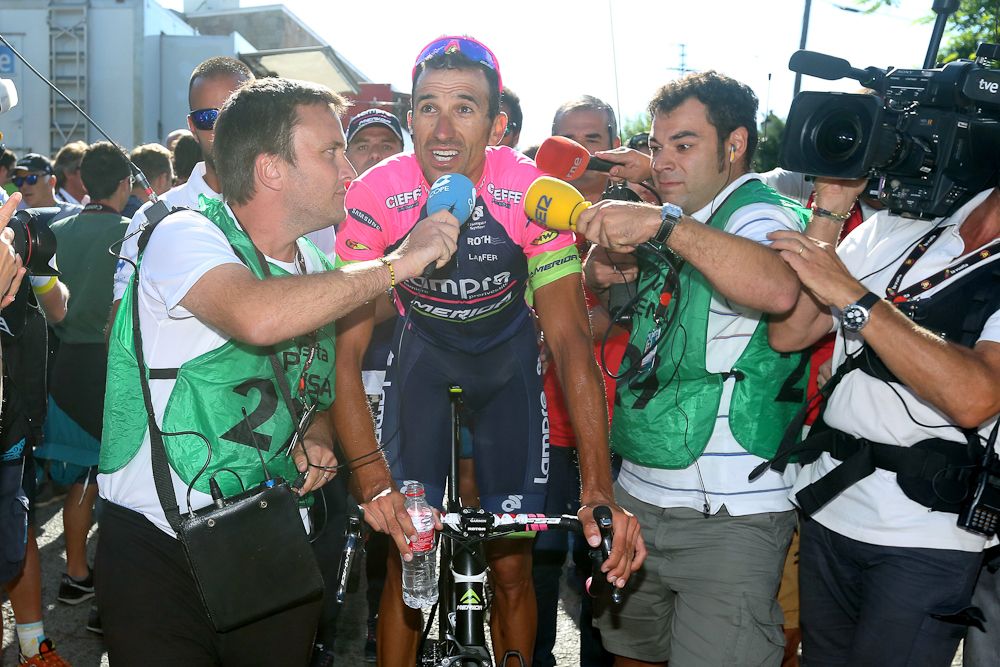 Media mob Ruben Plaza after stage 20.