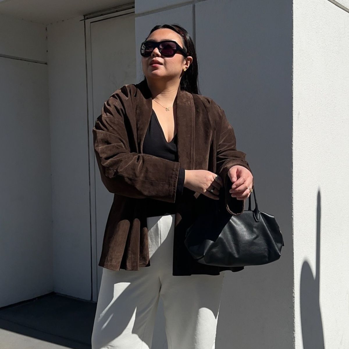 Marina wearing COS Bowling bag