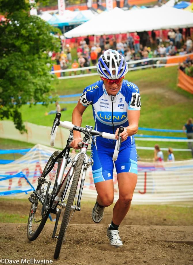 Katerina Nash (Luna Pro Team) running a set of stairs with the race lead