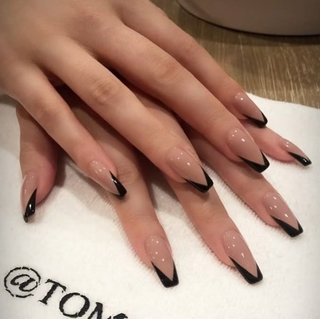 Ballerina nails with a black French tip