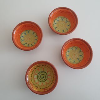 A set of second-hand painted dipping bowls