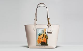 Tote bag with image and slogan 'this is a coach bag'