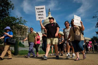 People protest the GOP health-care plan