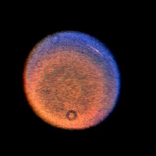False-color view of Uranus as seen by a Voyager spacecraft.