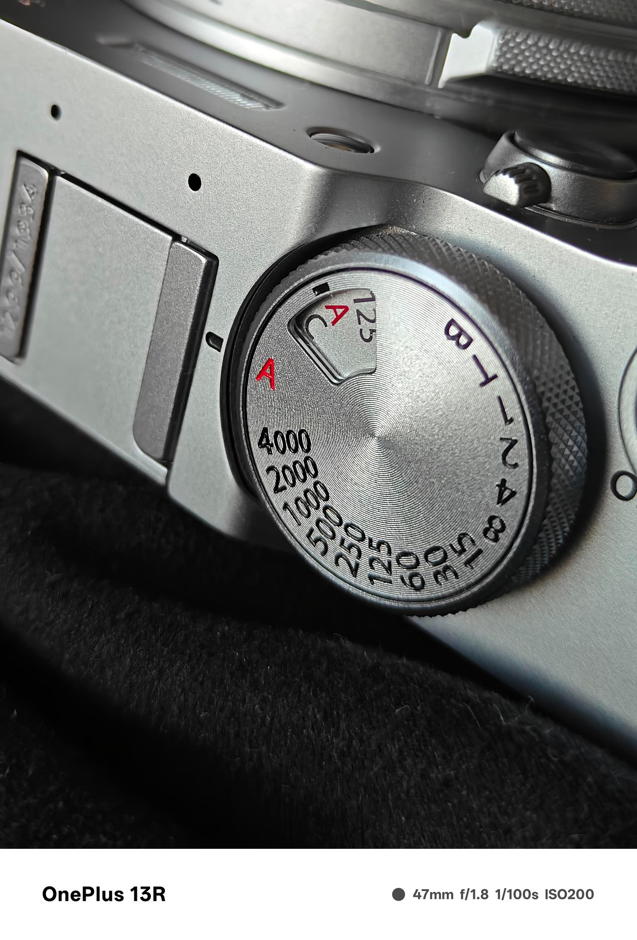 Close up of the shutter speed dial on a Fujifilm X100VI camera
