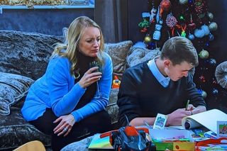 Arthur is emotional as Nicola holds a glass of wine