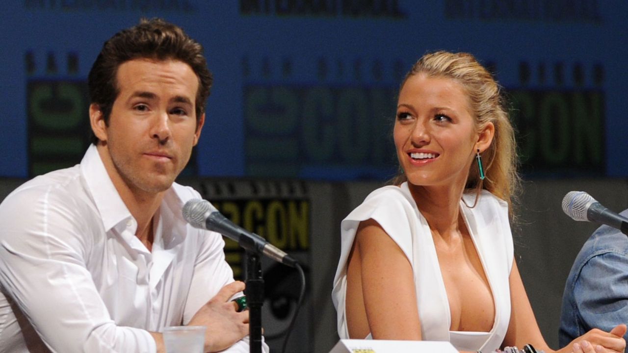 Ryan Reynolds and Blake Lively speak onstage at the Green Lantern panel discussion at Comic-Con