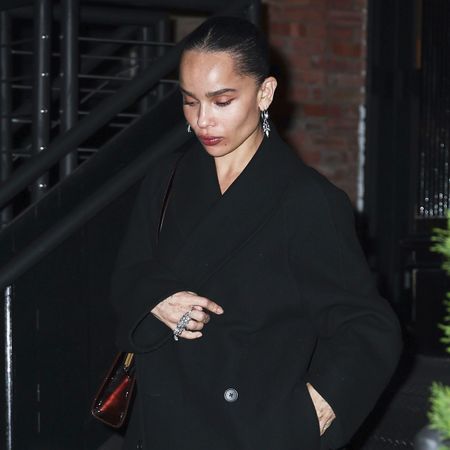 Zoe Kravitz wearing a black coat