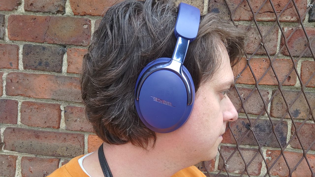 Photograph of man wearing Bose QuietComfort Ultra Gen 2 headphones