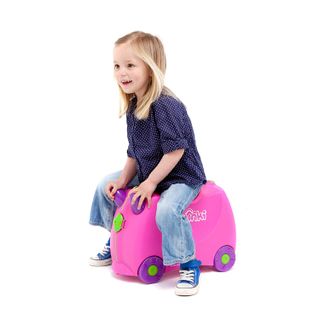 best design ideas: young girl riding a Trunki