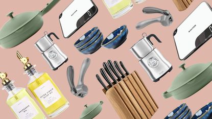 A selection of useful kitchen gadgets on pale pink background including garlic press, kitchen scales, kitchen knives and milk frother