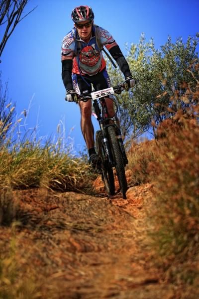 A rider on a trail during the Ingkerreke Commercial MTB Enduro