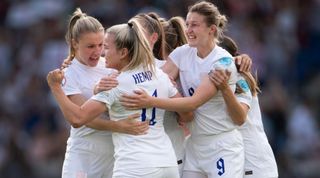 BRIGHTON, ENGLAND - JULY 11: Lauren Hemp of England celebrates her goal with Leah Williamson, Ellen White and team mates during the UEFA Women's Euro England 2022 group A match between England and Norway at Brighton & Hove Community Stadium on July 11, 2022 in Brighton, United Kingdom.