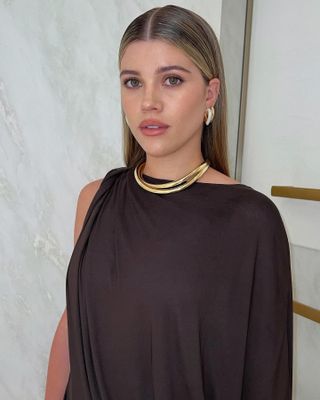 Sofia Richie Grainge with dark blonde hair