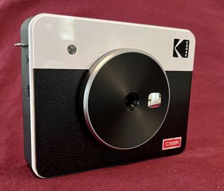 An image of the Kodak Mini Shot 3 Retro on a red background