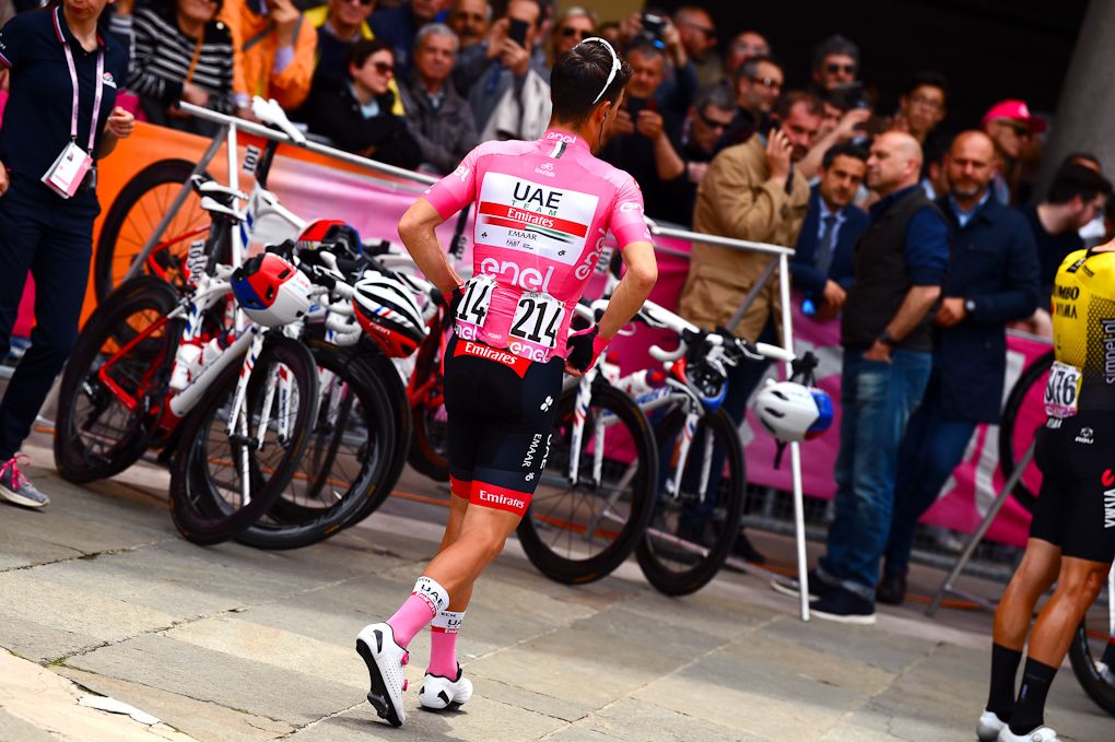 Race leader Valerio Conti walks to sign in before stage start of stage 10 at the Giro