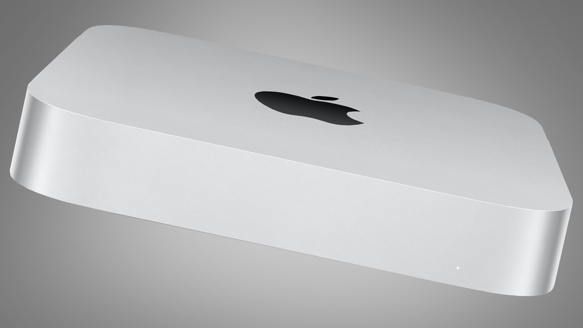 The Apple Mac Mini M2 on a gray background