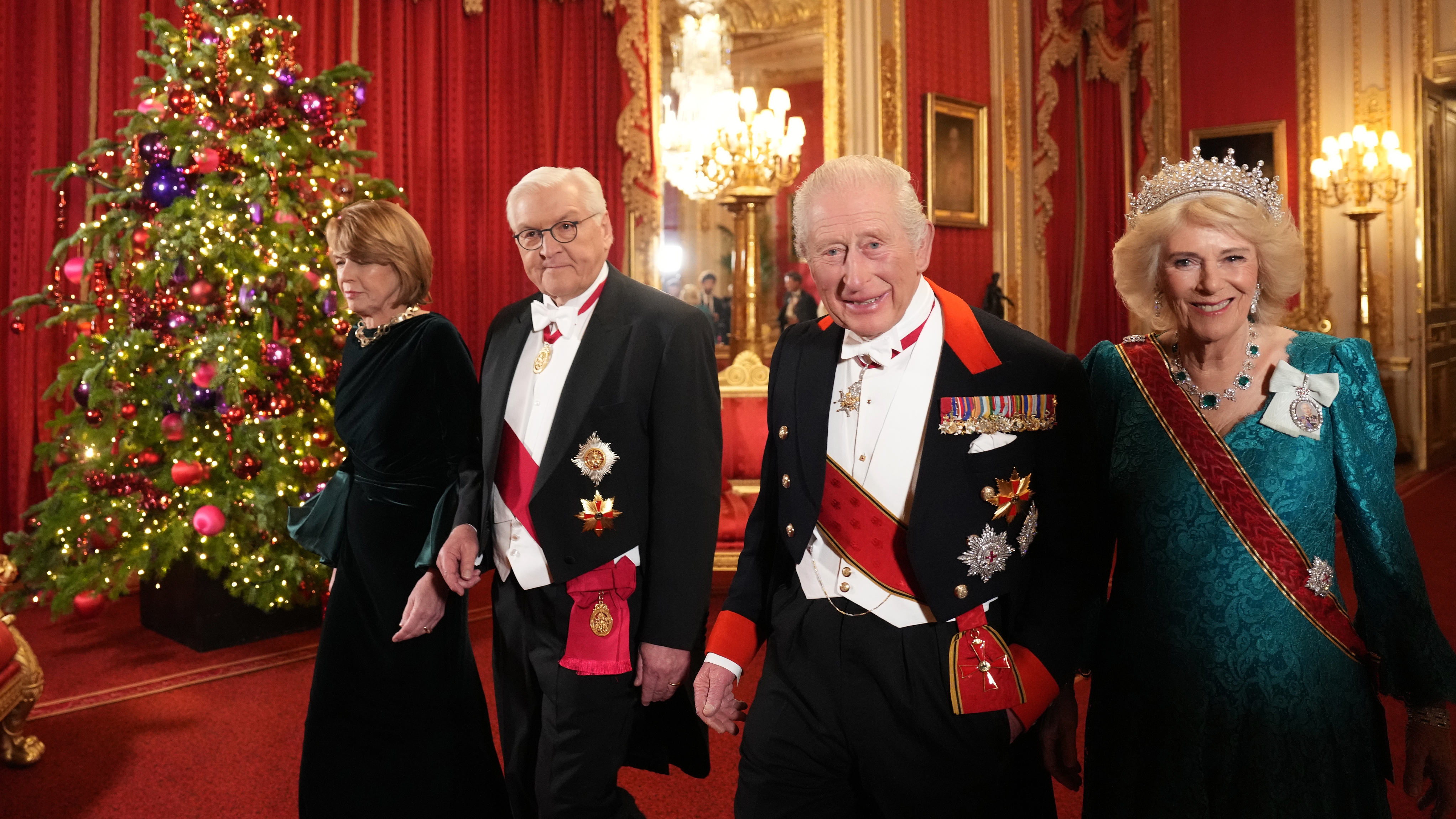 King Charles III (2R) and Queen Camilla (R) arrive with German President Frank-Walter Steinmeier and his wife Elke Budenbender ahead of the state banquet at Windsor Castle